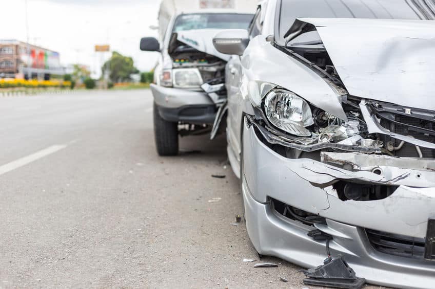 Modern car accident involving two cars on the road, Dan Rose Law, Car accident attorney